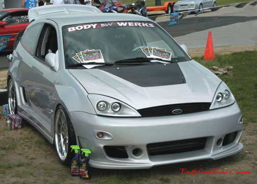 Lowriders that have been lowered, dropped, slammed, and scraping.