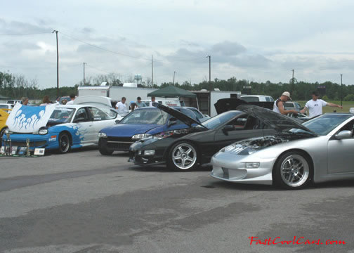 Lowriders that have been lowered, dropped, slammed, and scraping.