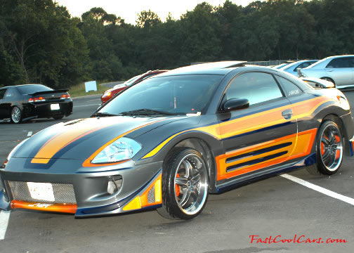 Lowriders that have been lowered, dropped, slammed, and scraping.