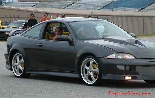 Lowriders that have been lowered, dropped, slammed, and scraping.