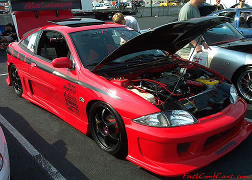 Lowriders that have been lowered, dropped, slammed, and scraping. Very low car.