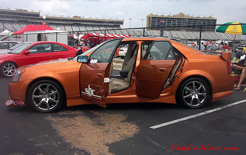 Lowriders that have been lowered, dropped, slammed, and scraping, using many different modifications.