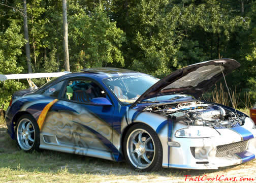 Lowriders that have been lowered, dropped, slammed, and scraping, using many different modifications. custom paint job, unbelieveable