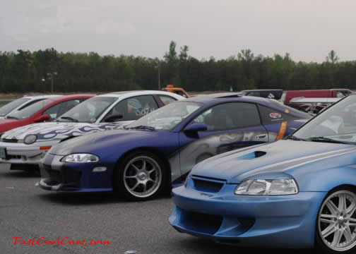 Lowriders that have been lowered, dropped, slammed, and scraping, using many different modifications.