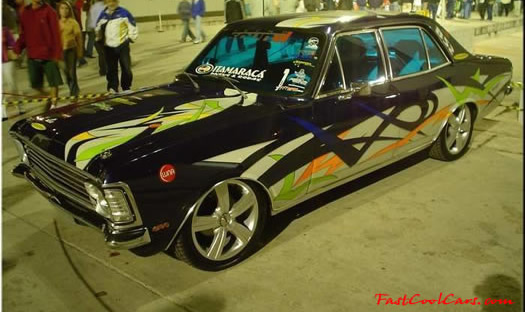 Lowriders that have been lowered, dropped, slammed, and scraping.