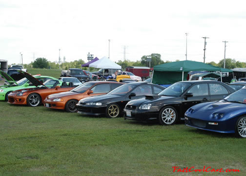 Lowriders that have been lowered, dropped, slammed, and scraping.
