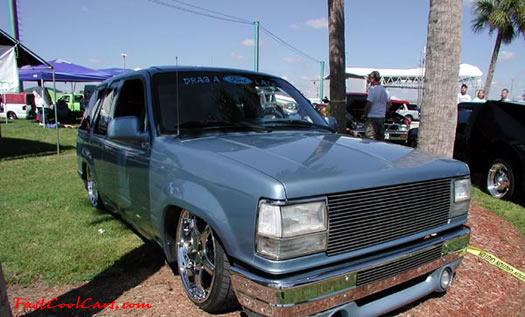 Lowriders that have been lowered, dropped, slammed, and scraping. truck.