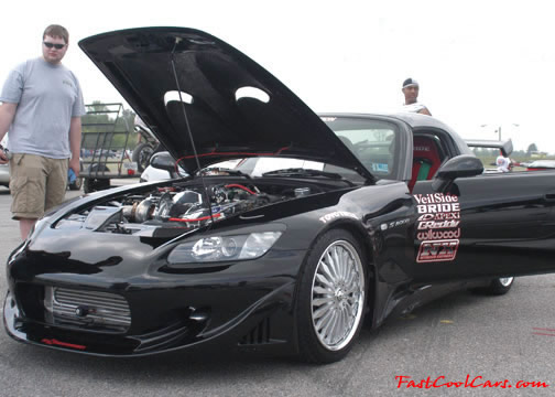 Lowriders that have been lowered, dropped, slammed, and scraping.