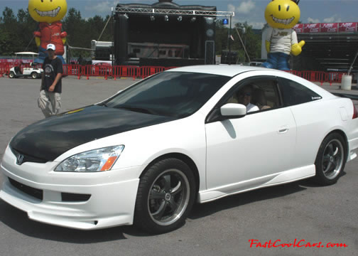Lowriders that have been lowered, dropped, slammed, and scraping.