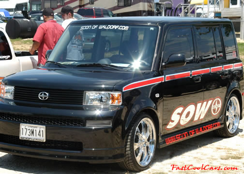 Lowriders that have been lowered, dropped, slammed, and scraping. Nice SUV.