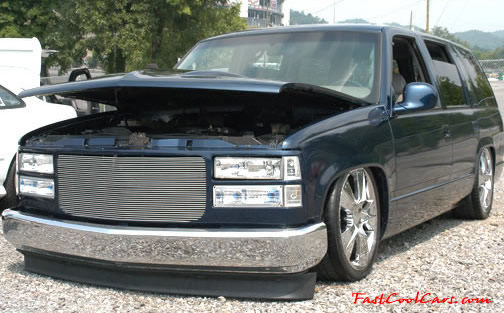 Lowriders that have been lowered, dropped, slammed, and scraping.