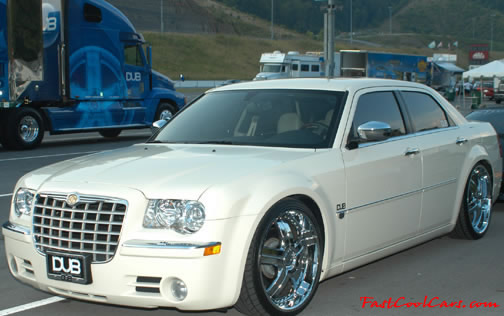 Lowriders that have been lowered, dropped, slammed, and scraping. DUB, need I say more.