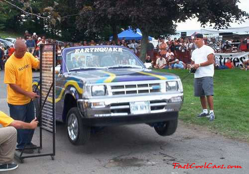 Lowriders that have been lowered, dropped, slammed, and scraping. Hydraulic bouncing height contest.