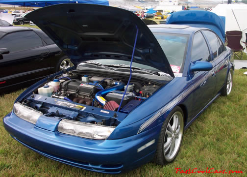 Lowriders that have been lowered, dropped, slammed, and scraping.