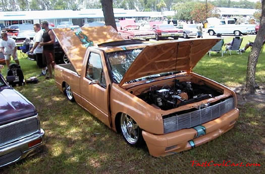 Lowriders that have been lowered, dropped, slammed, and scraping.