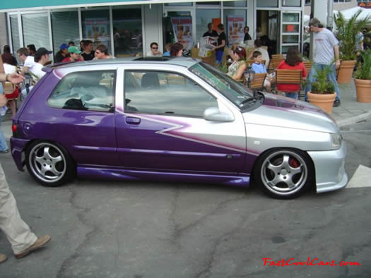 Lowriders that have been lowered, dropped, slammed, and scraping.