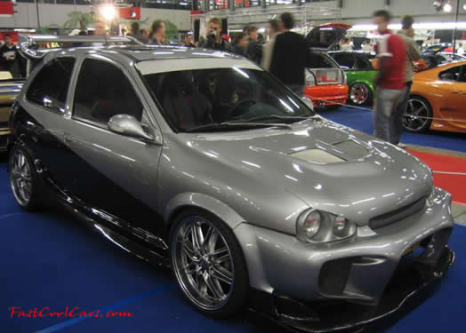Lowriders that have been lowered, dropped, slammed, and scraping.