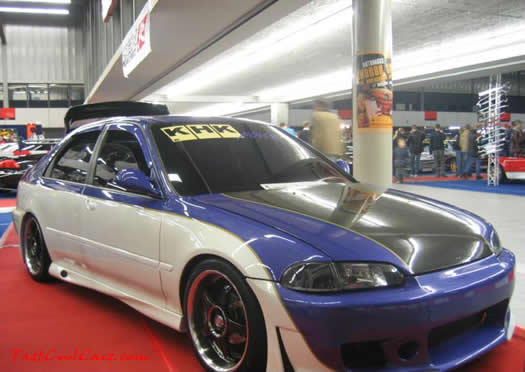 Lowriders that have been lowered, dropped, slammed, and scraping.