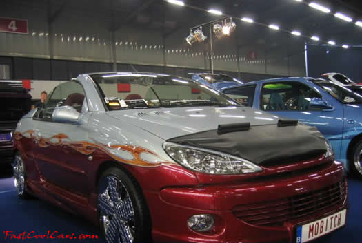 Lowriders that have been lowered, dropped, slammed, and scraping.