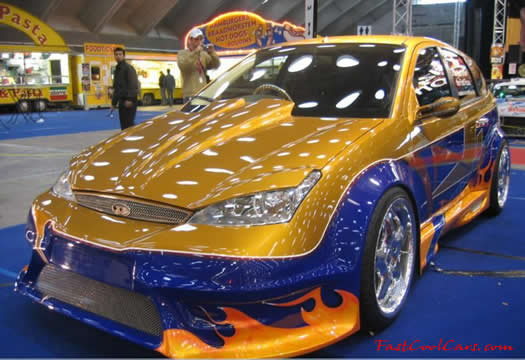 Lowriders that have been lowered, dropped, slammed, and scraping. Killer paint job.