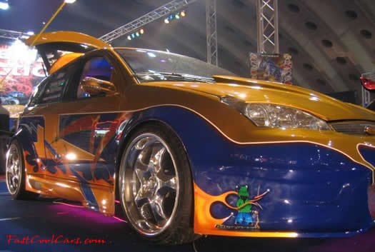 Lowriders that have been lowered, dropped, slammed, and scraping. Great paint job.