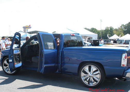 Lowriders that have been lowered, dropped, slammed, and scraping.