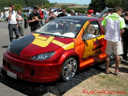 Lowriders that have been lowered, dropped, slammed, and scraping.