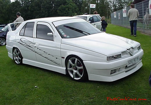 Lowriders that have been lowered, dropped, slammed, and scraping.
