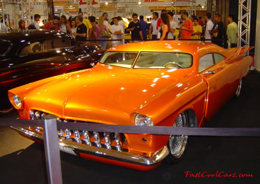 Lowriders that have been lowered, dropped, slammed, and scraping. Sweet classic.