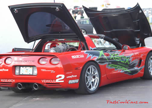 Lowriders that have been lowered, dropped, slammed, and scraping. Chevrolet Corvette, sweet.