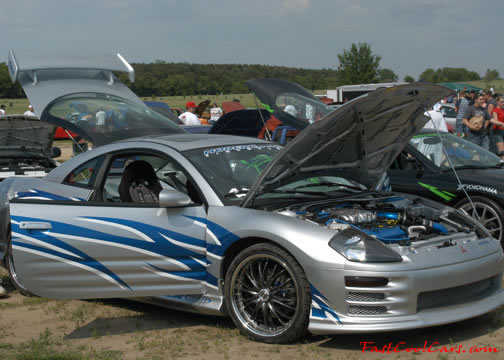 Lowriders that have been lowered, dropped, slammed, and scraping.
