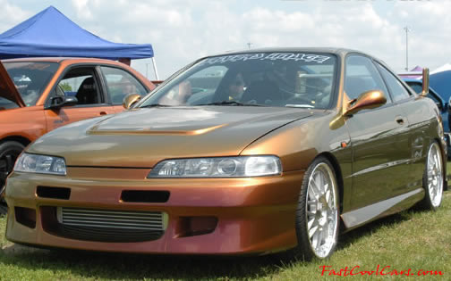 Lowriders that have been lowered, dropped, slammed, and scraping.