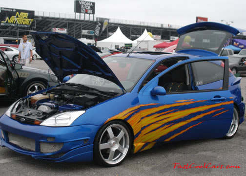 Lowriders that have been lowered, dropped, slammed, and scraping.