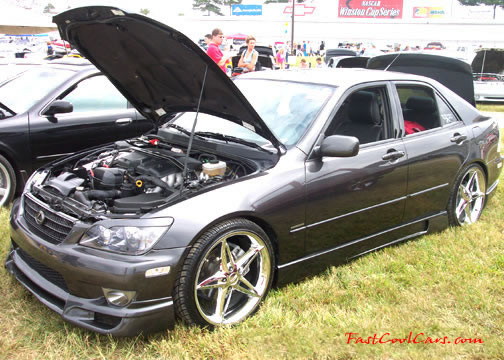 Lowriders that have been lowered, dropped, slammed, and scraping.