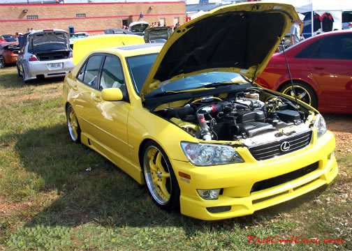 Lowriders that have been lowered, dropped, slammed, and scraping.