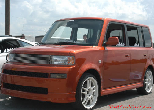 Lowriders that have been lowered, dropped, slammed, and scraping.