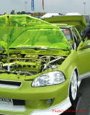 Lowriders that have been lowered, dropped, slammed, and scraping. Check out the see-thru hood, nice!