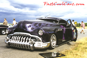 Lowriders that have been lowered, dropped, slammed, and scraping. Classic American lowrider.