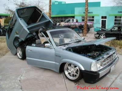 Lowrider pickup that has been lowered dropped slammed and scraping
