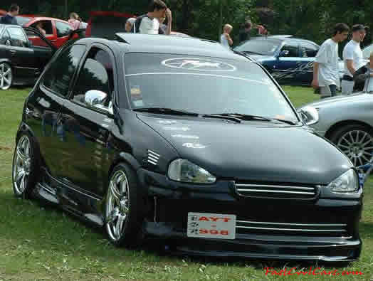 Lowriders that have been lowered, dropped, slammed, and scraping, using many different modifications.