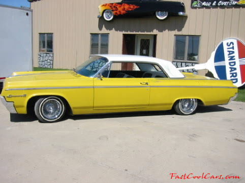 Lowriders that have been lowered, dropped, slammed, and scraping, using many different modifications.