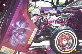 Lowriders that have been lowered, dropped, slammed, and scraping, using many different modifications.
