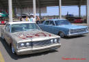 Lowriders that have been lowered, dropped, slammed, and scraping. Classic American Lowriders.