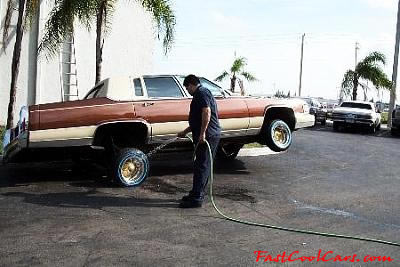 Lowriders that have been lowered, dropped, slammed, and scraping.