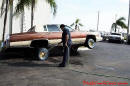Lowriders that have been lowered, dropped, slammed, and scraping.