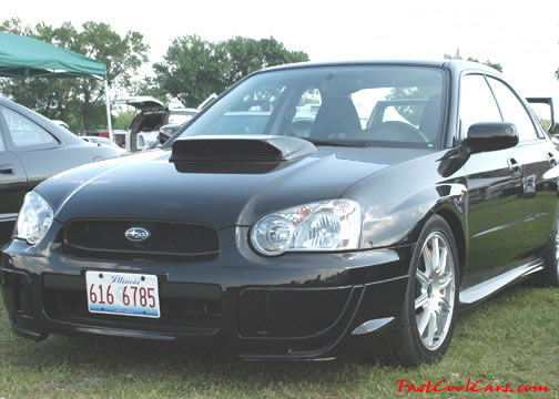 Lowriders that have been lowered, dropped, slammed, and scraping.