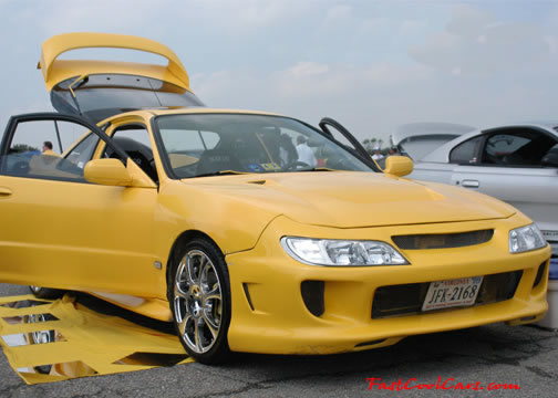 Lowriders that have been lowered, dropped, slammed, and scraping.