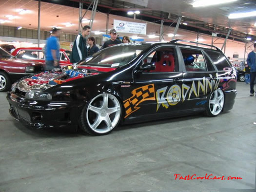 Lowriders that have been lowered, dropped, slammed, and scraping. Check out the engine detail.