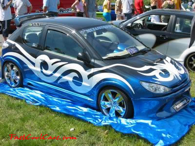 Lowriders that have been lowered, dropped, slammed, and scraping.
