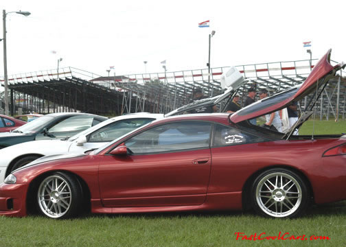 Lowriders that have been lowered, dropped, slammed, and scraping.